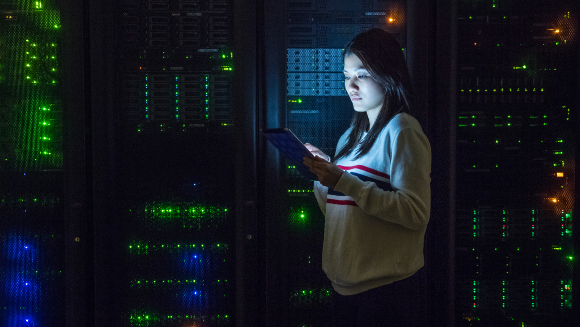 Woman standing in server room