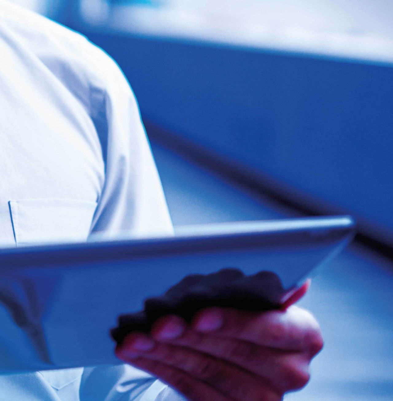 Continuation of image of businessman holding tablet